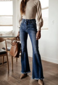 woman wearing flared jeans