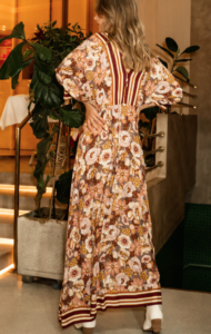 woman in a printed maxi dress